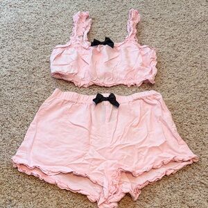 Elegant Pink Sleepwear Set with Black Bow Accents